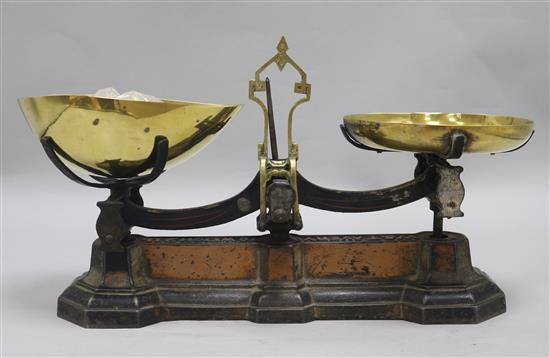 A pair of 19th century brass and iron scales and weights